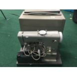 Pfaff 91 electric sewing machine in case.