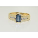 18ct yellow gold Ceylon sapphire and diamond ring. Size M 1/2.