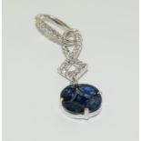 18ct white gold large sapphire and diamond drop pendant.