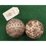 A pair of carved wooden ornamental balls (REF 18).