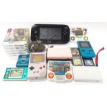 Collection of handheld gaming consoles and games to include Nintendo Game Boy, Nintendo DS and