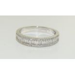 18ct white gold baguette and round diamond half eternity band ring. Size O.