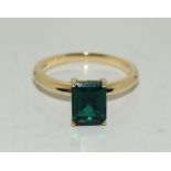 An Emerald set in 9ct gold ring, size Q
