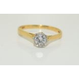 A large vintage 18ct gold VS diamond solitaire ring. Diamond measures just under 5mms or over 0.5ct.