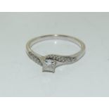 A Diamond Twist 18ct white gold ring size U