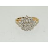 18ct gold ladies diamond cluster ring - approx 1ct. Size O.