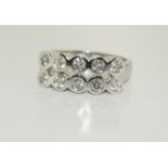 Heavy 6.6g 18ct white gold double row diamond ring. Size Q 1/2.