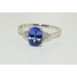 18ct white gold tanzanite and diamond ring. Size N 1/2.