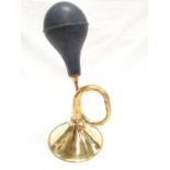 A brass taxi horn (HI128).