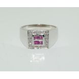 An 18ct white gold diamond/ruby gents ring, 8.5g new, size W