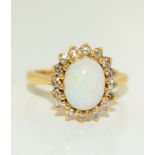 Vintage 18ct Gold Opal and Diamond Cluster Ring, Size K. 4.7 grams.