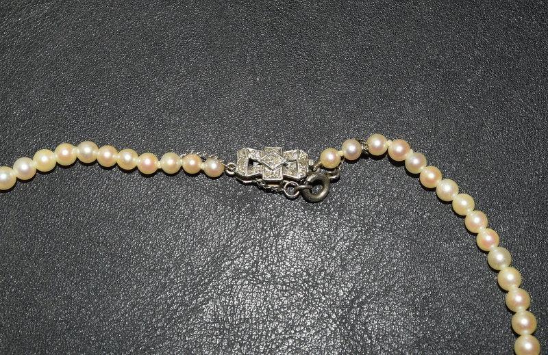 A Strand of Graduated Cultured Sea Oyster Pearls with a Diamond Bow Clasp. - Image 4 of 5