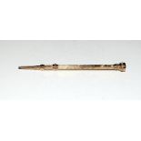 Gold Propelling Pencil with hard Stone set end.