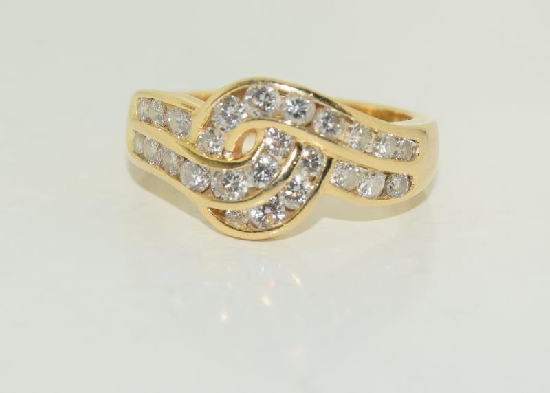 18ct Gold ladies Diamond Knot ring, Size J.