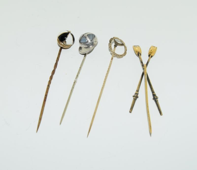 A collection of stickpins to include, 2 jockey caps. (NI007)