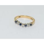 9 carat gold ladies V ring set with diamonds and Sapphires hallmarked size N