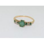 10ct Gold Ladies Diamond & Emerald Ring. Size P