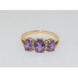 14 ct gold ladies 3 stone amethyst ring size N