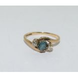 9ct Gold Ladies Diamond & emerald Twist Ring Size M