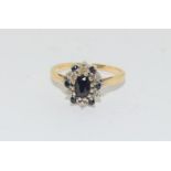 9 carat gold ladies sapphire and diamond hallmarks cluster ring size L