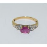 9 carat gold ladies Rubylight and diamond ring size N