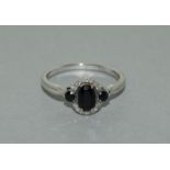 9 carat white gold ladies sapphire and diamond modernist ring size N