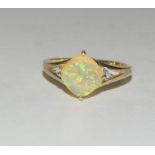 9ct gold firey natural opal and diamond dress ring. Size N 1/2.