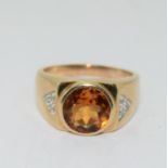 9ct Gold Gent's Signet Ring, with Amber Central Stone and Diamond Chip Shoulders. Size S