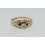 9ct gold and sapphire gypsy ring. Size N.