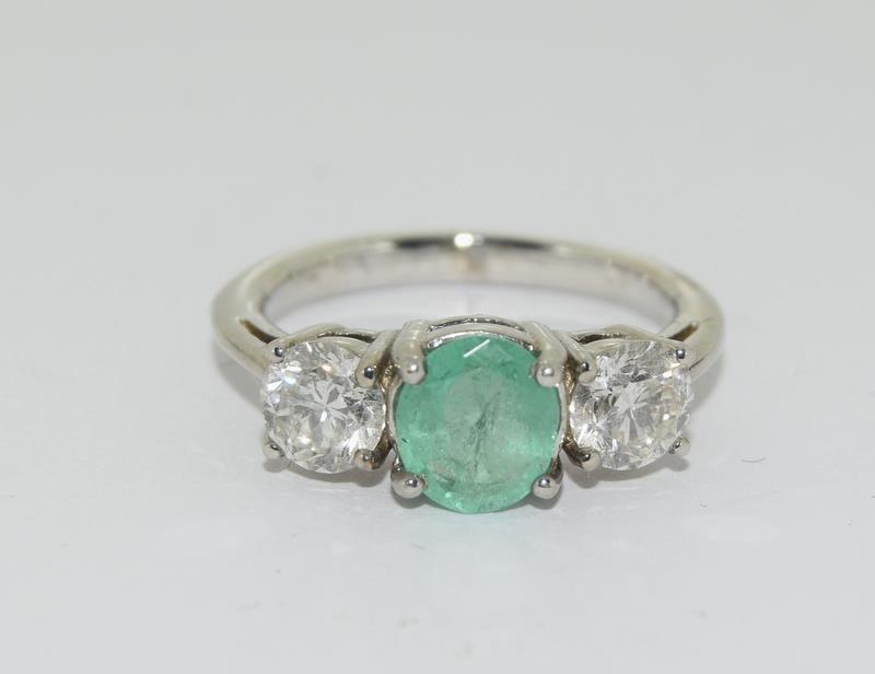 An 18ct white gold emerald and diamond ring of 1.8cts approx.