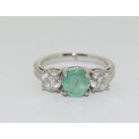 An 18ct white gold emerald and diamond ring of 1.8cts approx.