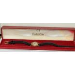 18ct Gold ladies Omega manual wind wrist watch, boxed.