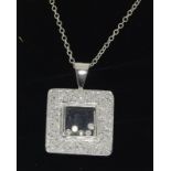 A 14ct white gold diamond Geometric glazed panel pendant.