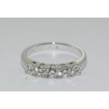 An 18ct white gold five stone diamond ring of 1.2cts. Size M
