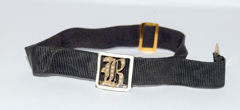 Victorian mourning bracelet with 9ct gold and enamel mounts