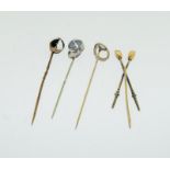 A collection of stickpins to include, 2 jockey caps. (NI007)