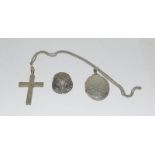 Silver locket, cross and filigree jockey helmet. 55 grams.