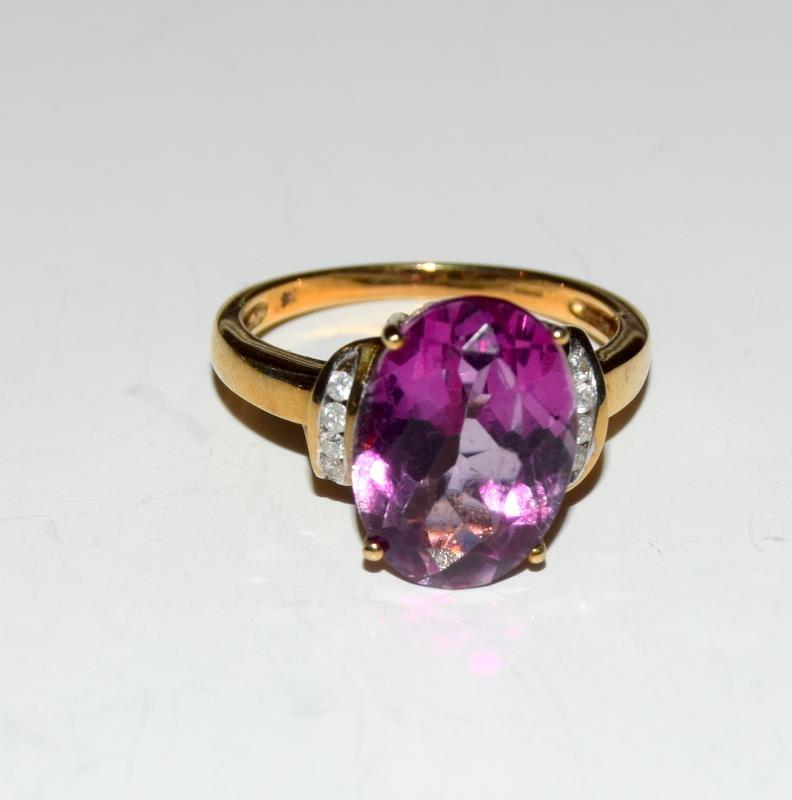 9ct Gold Ladies Pink Topaz and Diamond Ring, Size O.
