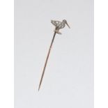 Antique gold and old cut diamond stick pin in the form of a Curlew bird