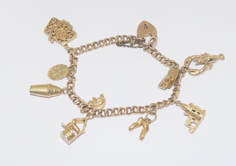 9ct Gold Charm Bracelet with 9 Charms