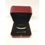 Cartier 18ct Gold and Diamond Love Bangle -10 diamonds. Size 20 with adjusting screwdriver, boxed.