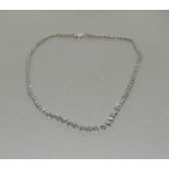 A fine quality 18ct white gold diamond necklace of 7.5cts 120 stones approx.