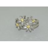 18ct Gold Diamond and Yellow Sapphire flower ring.