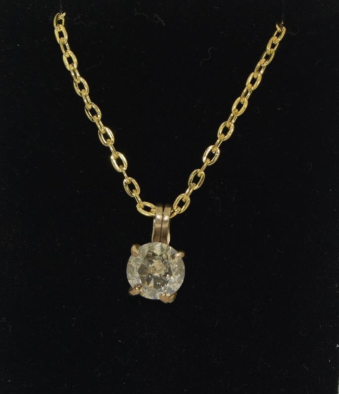 A yellow gold champagne diamond pendant necklace of 2.2cts.