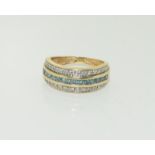 14ct gold ladies blue diamond and white diamond ring. Size N+. 3.8g.