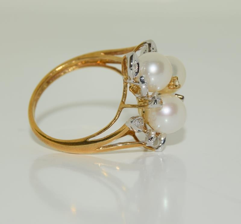 A 9ct gold ladies diamond and pearly cluster ring, Size N. - Image 2 of 3