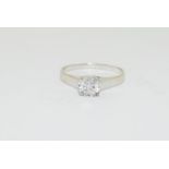 A 14ct white gold diamond solitaire ring, Approx 1ct, Size R
