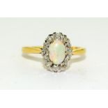 18ct Yellow Gold Opal and Diamond ring. Size O.