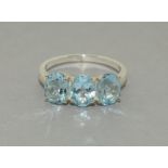 Large Ice Blue Topaz 925 Silver Trilogy Ring. Size Q1/2.