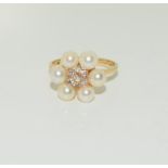 14ct gold pearl and diamond ring. Size N.